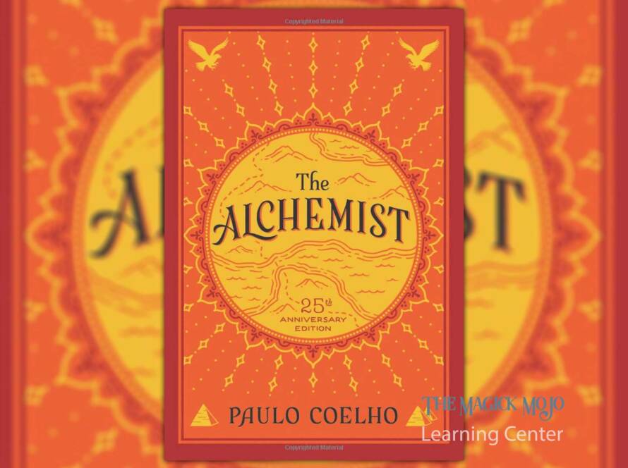 The Alchemist book cover featuring an image of a desert landscape with pyramids in the distance