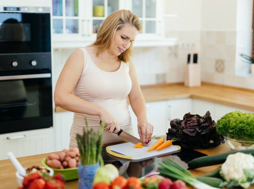 Woman Cooking a Healthy Meal in the Kitchen