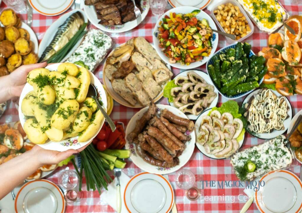 A table filled with a variety of colorful summer foods for a festive feast.